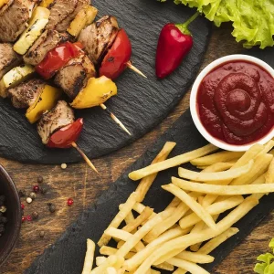top-view-delicious-kebab-with-french-fries-ketchup